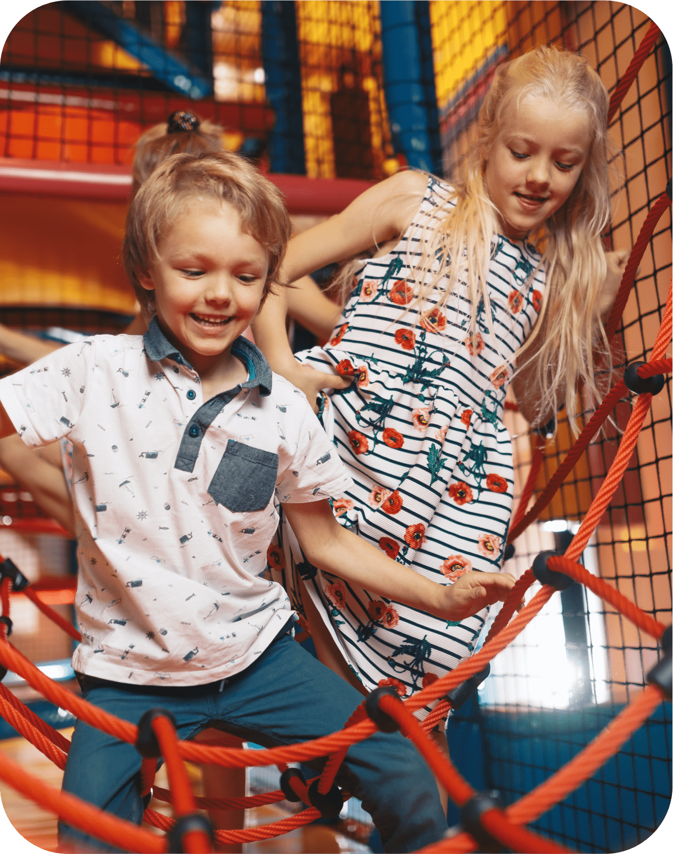 Two kids having fun on play equipment