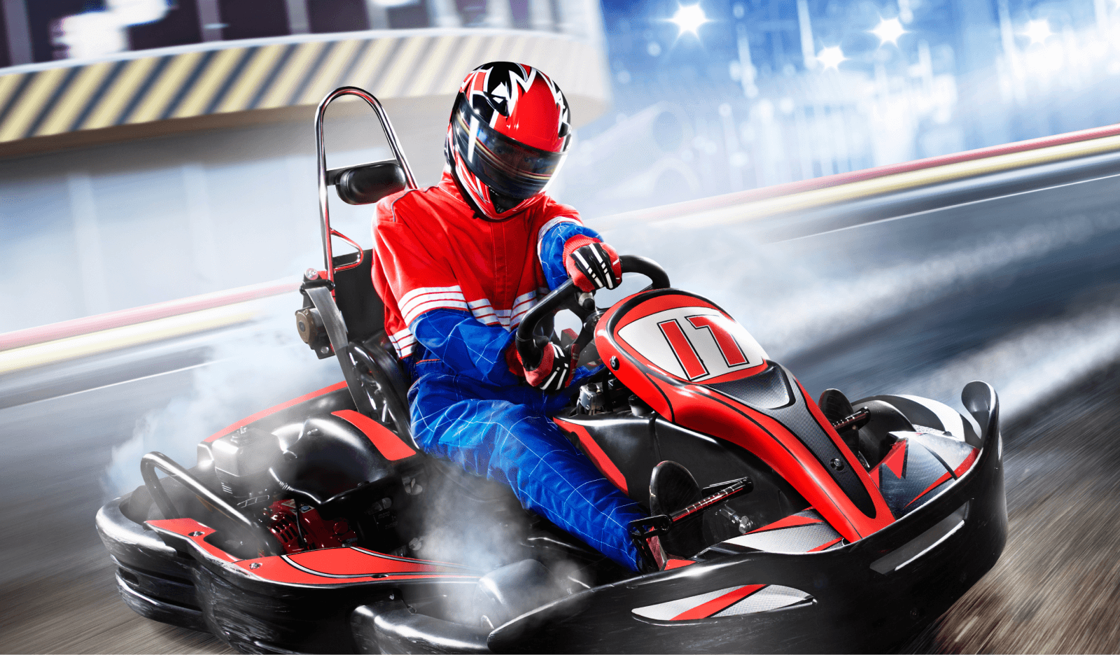 A go kart driving racing around a track