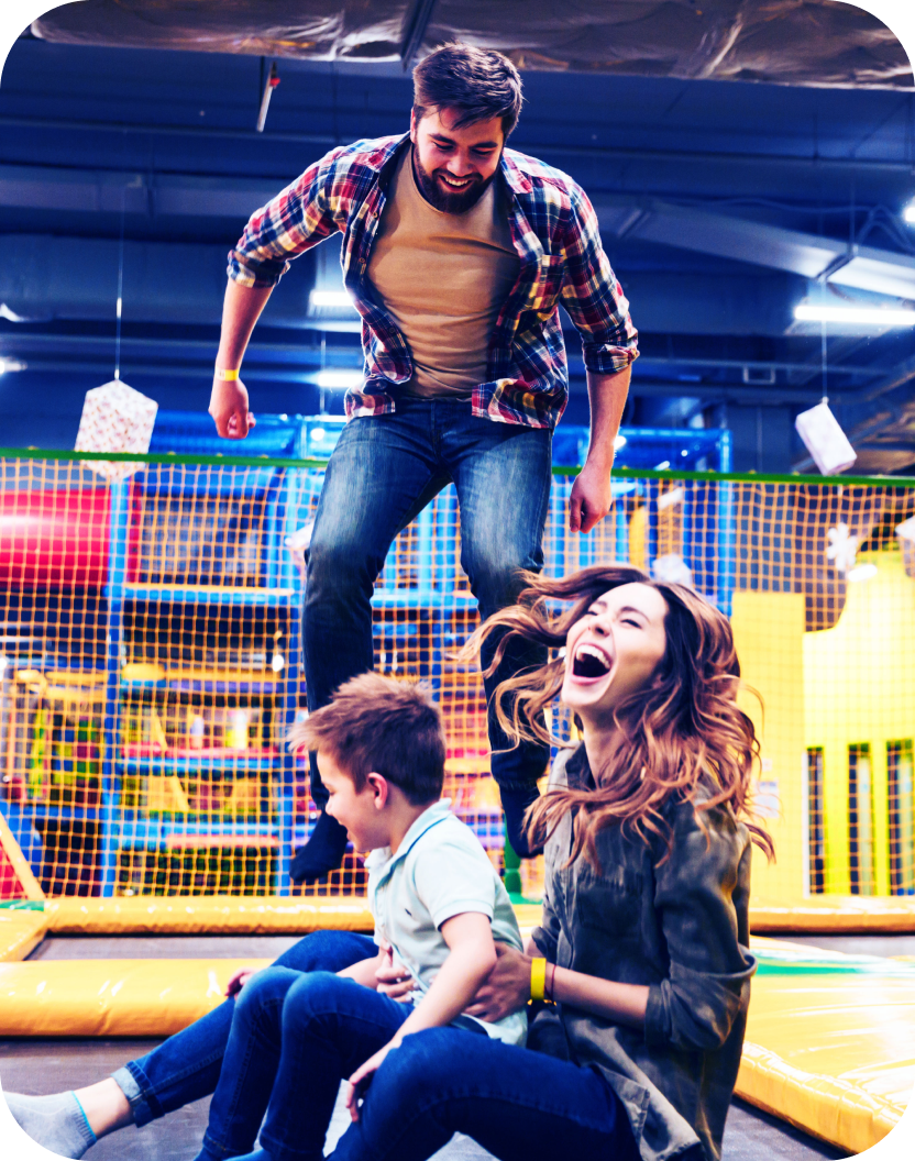 Family in trampoline park