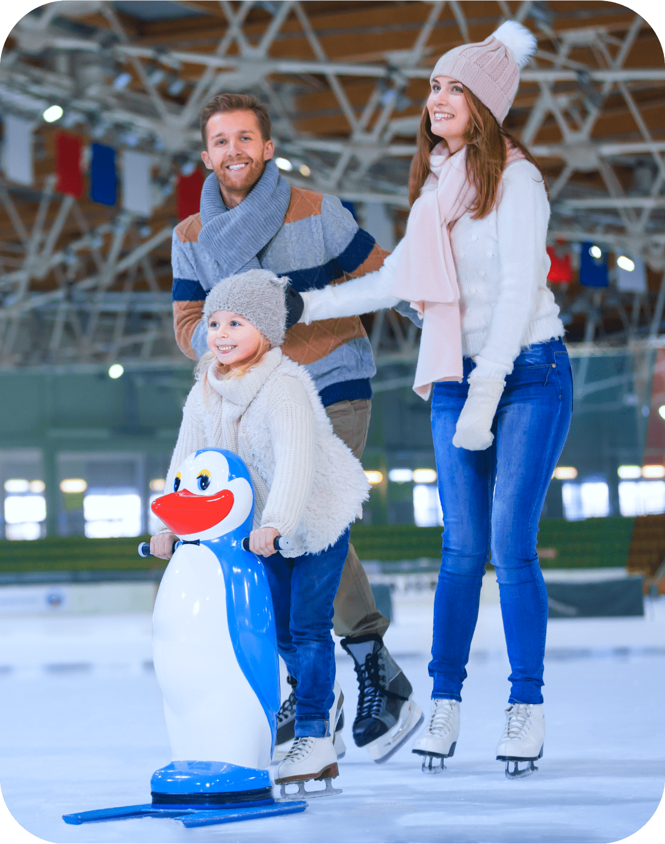 Family enjoying time together on an ice rink