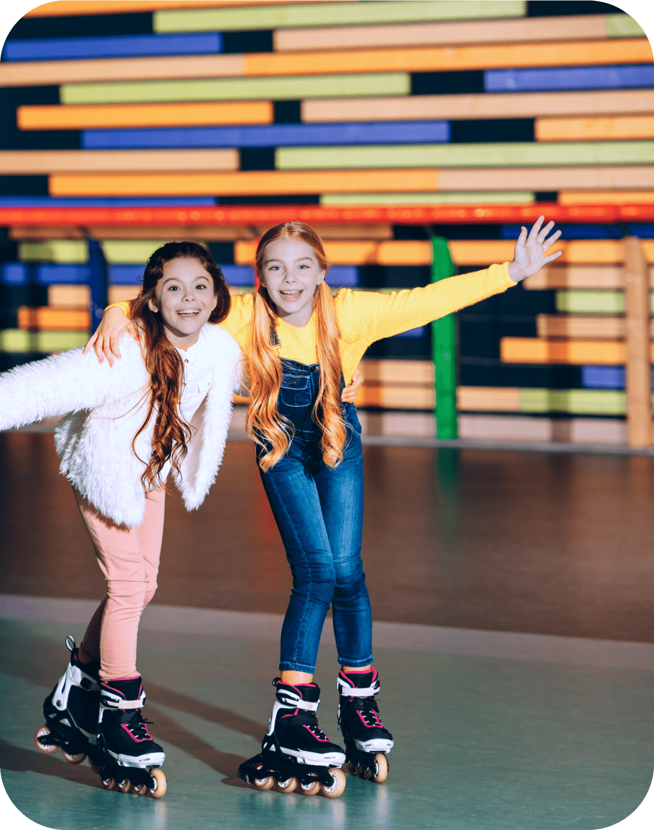 Kids roller skating at a rink