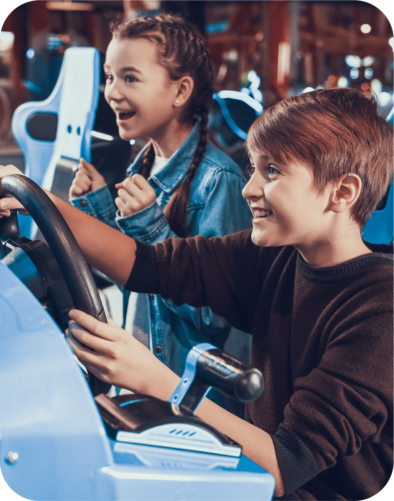 Cheerful children enjoying attractions at a family entertainment center