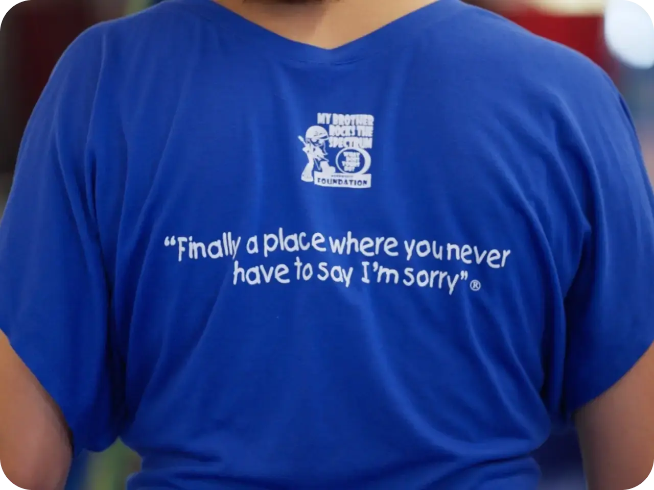 Team shirt printed with the motto: Finally a place where you never have to say I'm sorry